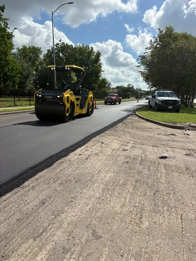 Fresh asphalt placement on a Houston-area roadway